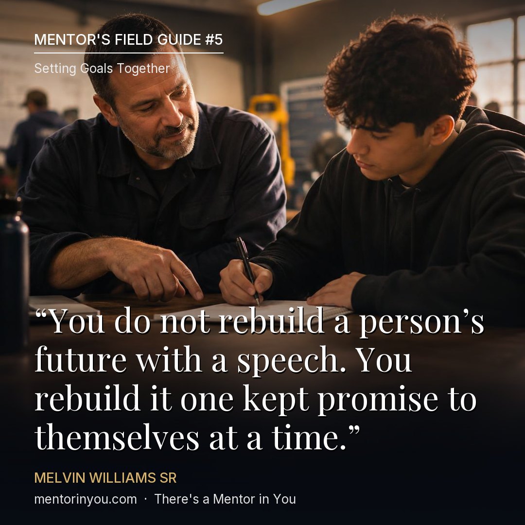 Mentor's Field Guide #5, Setting Goals Together: a mentor and a young man writing goals in a notebook at a workforce training center, with the quote “You do not rebuild a person’s future with a speech. You rebuild it one kept promise to themselves at a time.” — Melvin Williams Sr