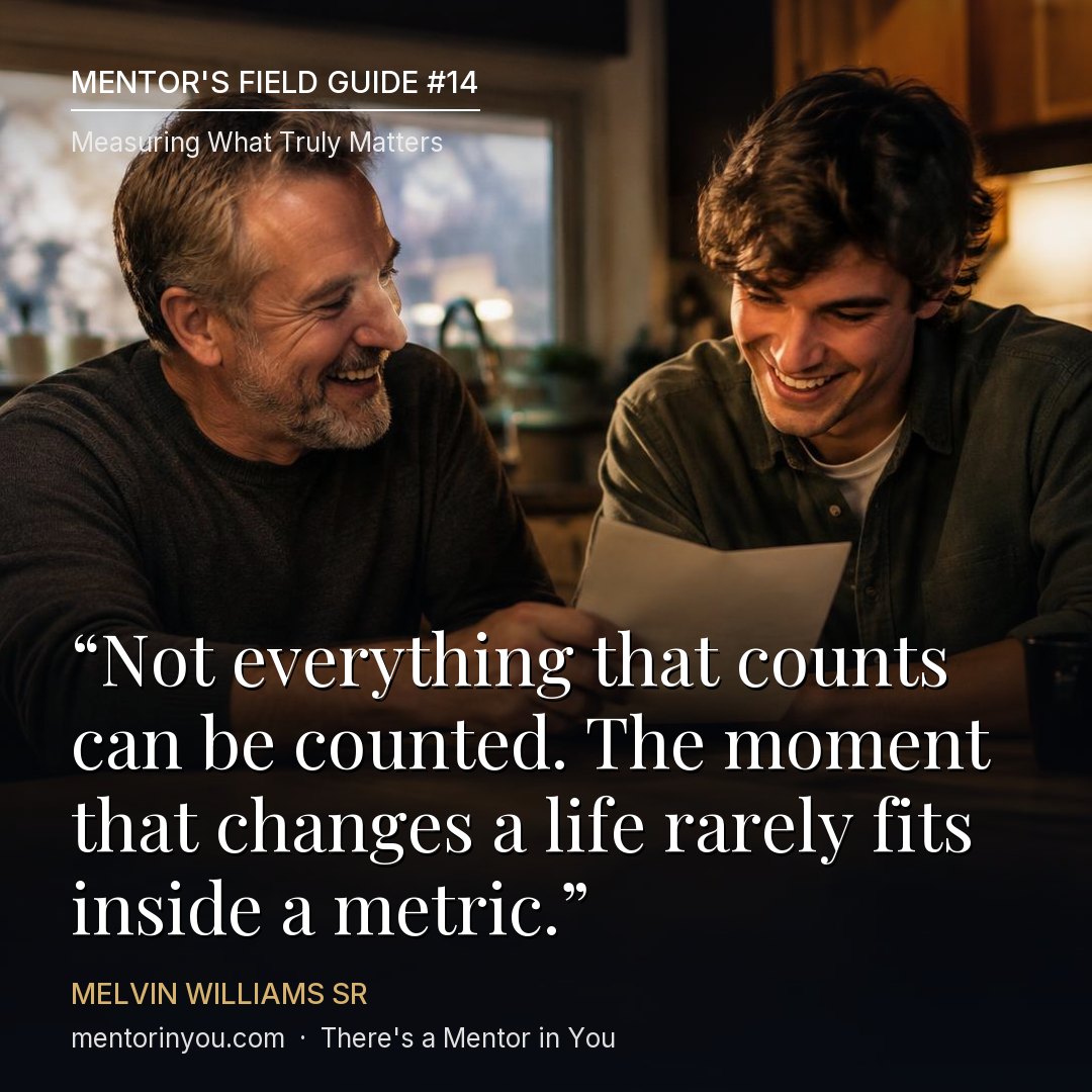 Mentor's Field Guide #14, Measuring What Truly Matters: a mentor and a young man laughing together over a letter at a kitchen table, with the quote “Not everything that counts can be counted. The moment that changes a life rarely fits inside a metric.” — Melvin Williams Sr