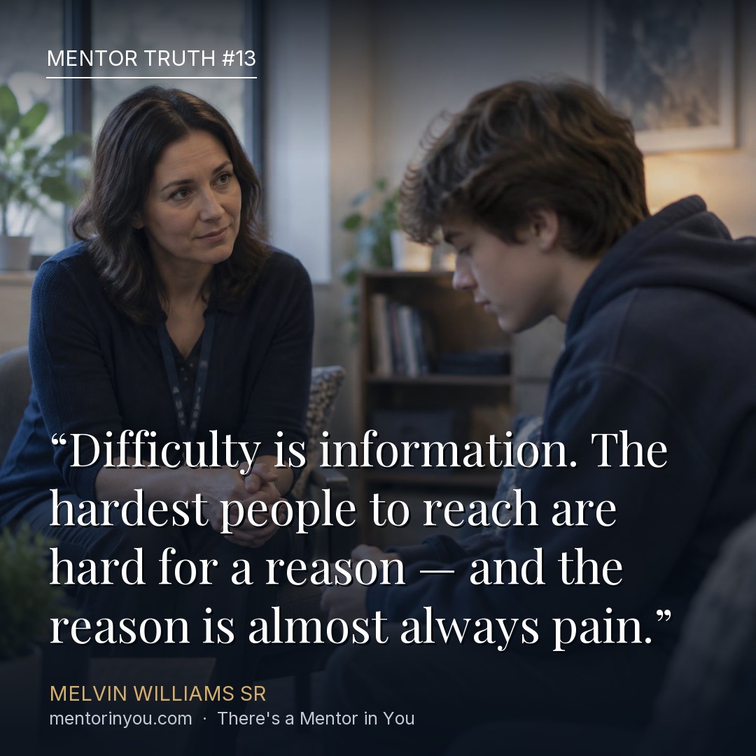 Mentor Truth 13: a school counselor sitting knee to knee with a withdrawn teenage boy in a quiet office, over the quote “Difficulty is information. The hardest people to reach are hard for a reason — and the reason is almost always pain.” — Melvin Williams Sr